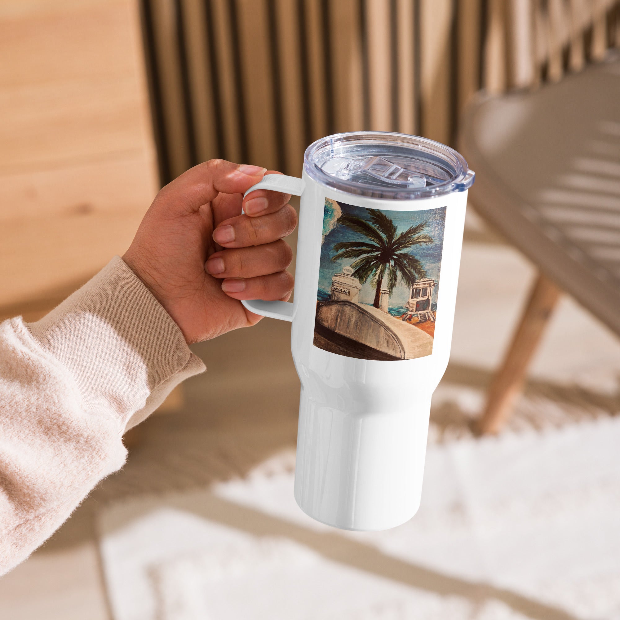Travel mug with a handle